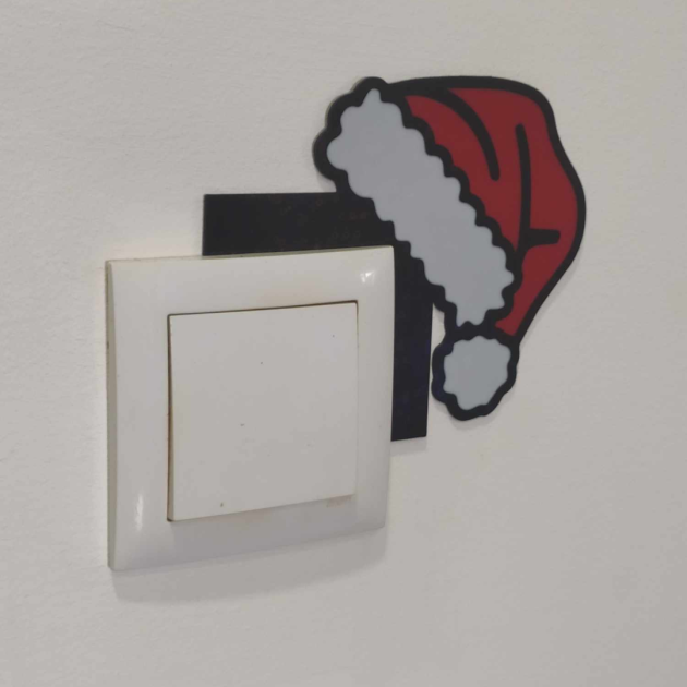 Canto para interruptor de luz em formato chapéu pai natal
